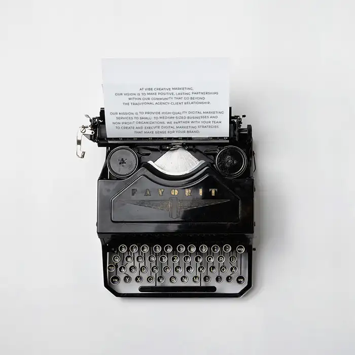 Typewriter with Mission on Paper